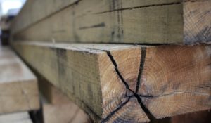 A closeup of stacked lumber