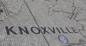 A photo of a concrete map of Tennessee cropped to feature the word Knoxville