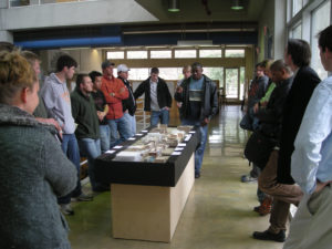 group standing by exhibit