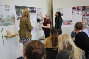 Students present their work to an audience