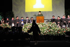 Stage party and silhouette of graduate