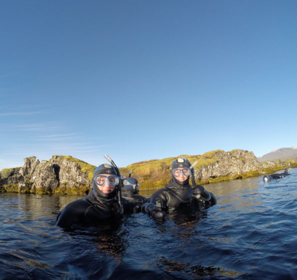 Bittinger and Taylor in the water at Iceland's silfra fissure
