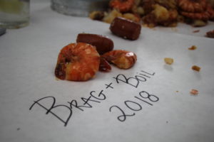 Brag + Boil written on table