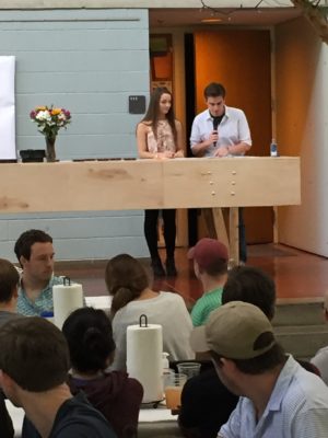 Students presenting awards at Brag + Boil