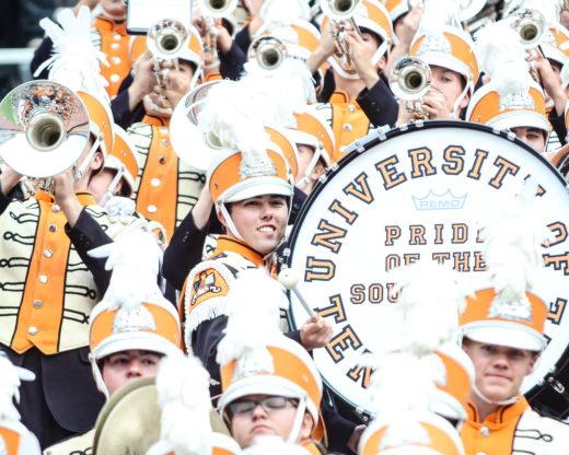 Cody Grooms with drum in stands at Neyland Stadium