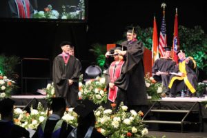 IA student being hooded at Spring Commencement 2018