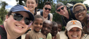 Haiti student selfie with Haitian children 2018