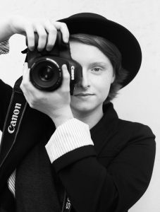 Art major, Caroline Rowcliffe with a camera