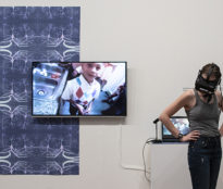 Person wearing a VR headset during exhibit