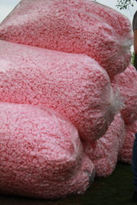 Bags of pink packing peanuts