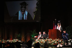 student speaking at graduation