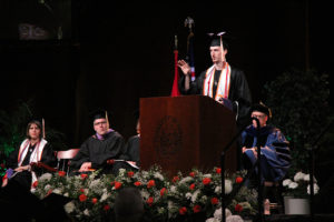student speaking at graduation