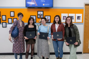 The 2019 recipients of the Research in Arts Scholarship with their professor