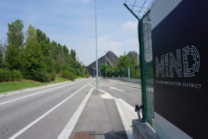Milan Italy with MIND road sign