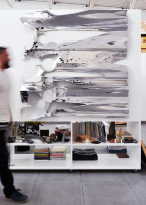 Wall unit with an abstract sculpture by Jeremy Magner