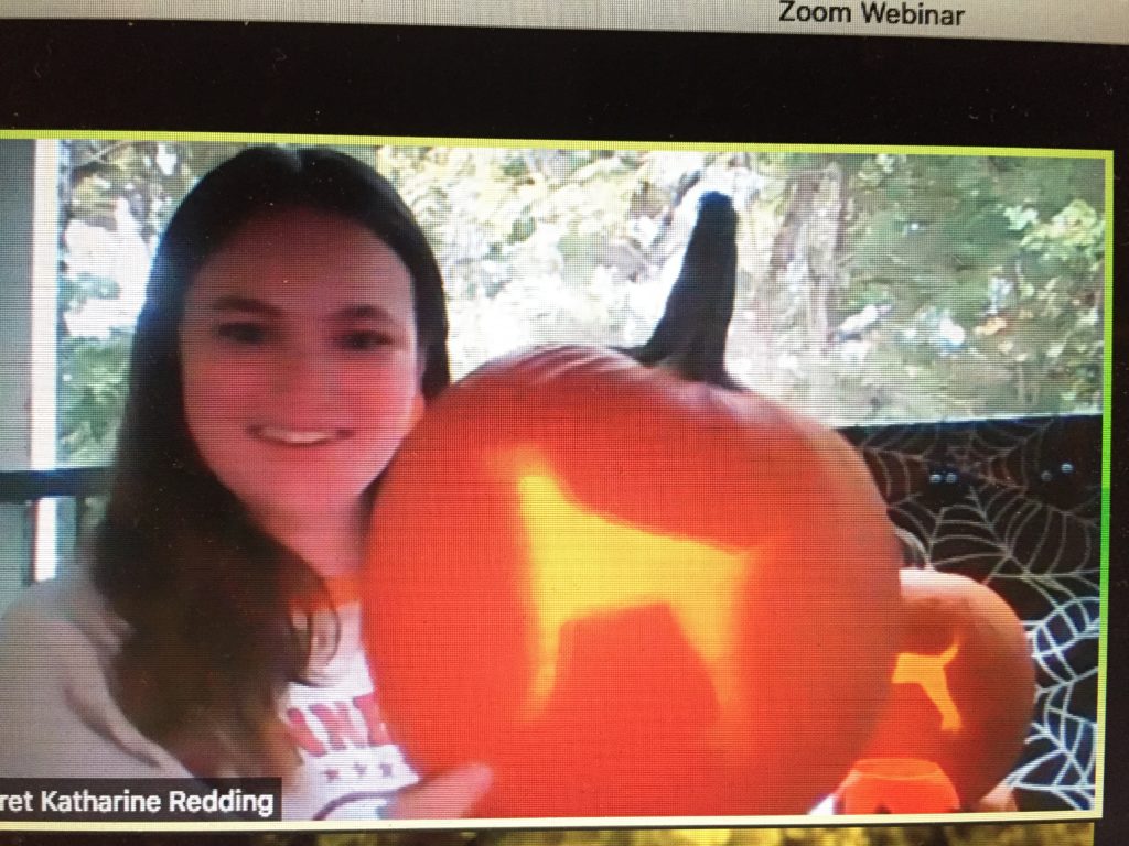 screenshot of student with lighted Jack o'lantern