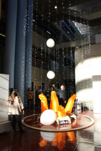 vertical exhibit with air tubes and floating balls