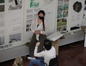 image of student and faculty at final reviews