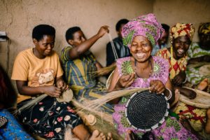 African artisans weaving baskets