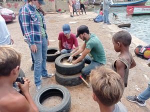 people working on tire seating