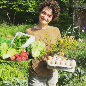 Marilyn Reish holding vegetables