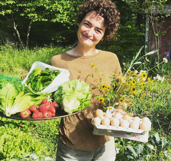 Marilyn Reish holding vegetables