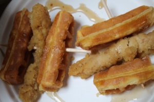 plate of chicken and waffles at brag and brunch 2022