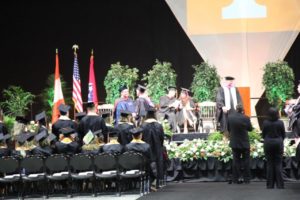 hooding during commencement 2022