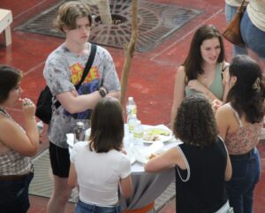 students talking while eating together
