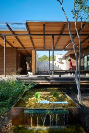 structure with outdoor courtyard and flowing water