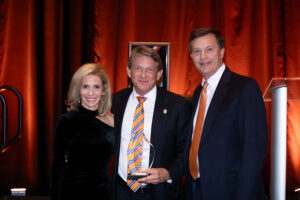 Jeff and Marla Gerber with UT System President Randy Boyd at the President's Council ninth annual showcase and awards dinner. From left to right: Marla Gerber, Randy Boyd, and Jeff Gerber.