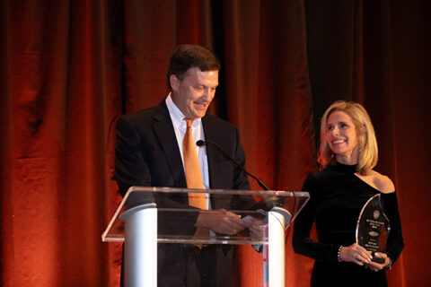 Jeff Gerber at the podium, alongside his wife, Marla Gerber, at the President's Council ninth annual showcase and awards dinner.