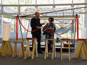 Professor David Matthews and Knoxville Asian Festival Executive Director Kumi Alderman cut the ribbon on the mobile teahouse.