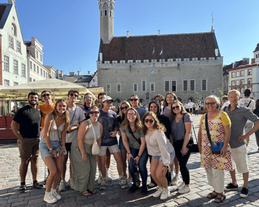 Beshoy Daniel and members of the Finland Architecture Institute cohort at Tallinn's Town Hall Square (Raekoja plats) in the Old Town of Tallinn, Estonia.