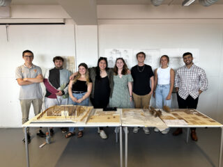 Beshoy Daniel, far right, and cohort members infront of a project.