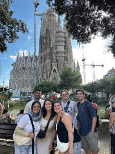 Beshoy Daniel, back left, with friends in front of the La Sagrada Família in Barcelona, Spain.