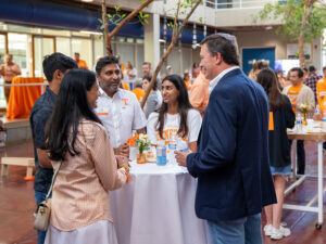 Jeff Gerber, far left, stands with the family of a Gerber Scholar during the Gerber Family Weekend Tailgate.