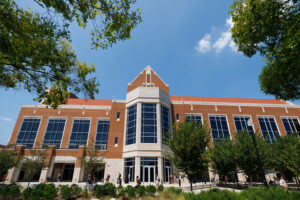 Students walk in front of Rocky Top Dining Hall along Andy Holt Ave.