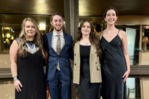 Lindsey Brine, associate professor of practice, attends the 2025 Knoxville American Advertising Awards with three student awardees. From left to right: Brine, Alexander Long, Nola Mooney, and Lillian Nagdeman.