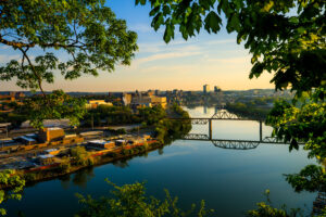 A scenic view of campus, downtown Knoxville, and the Tennessee River at sunrise from the River Bluff overlook.